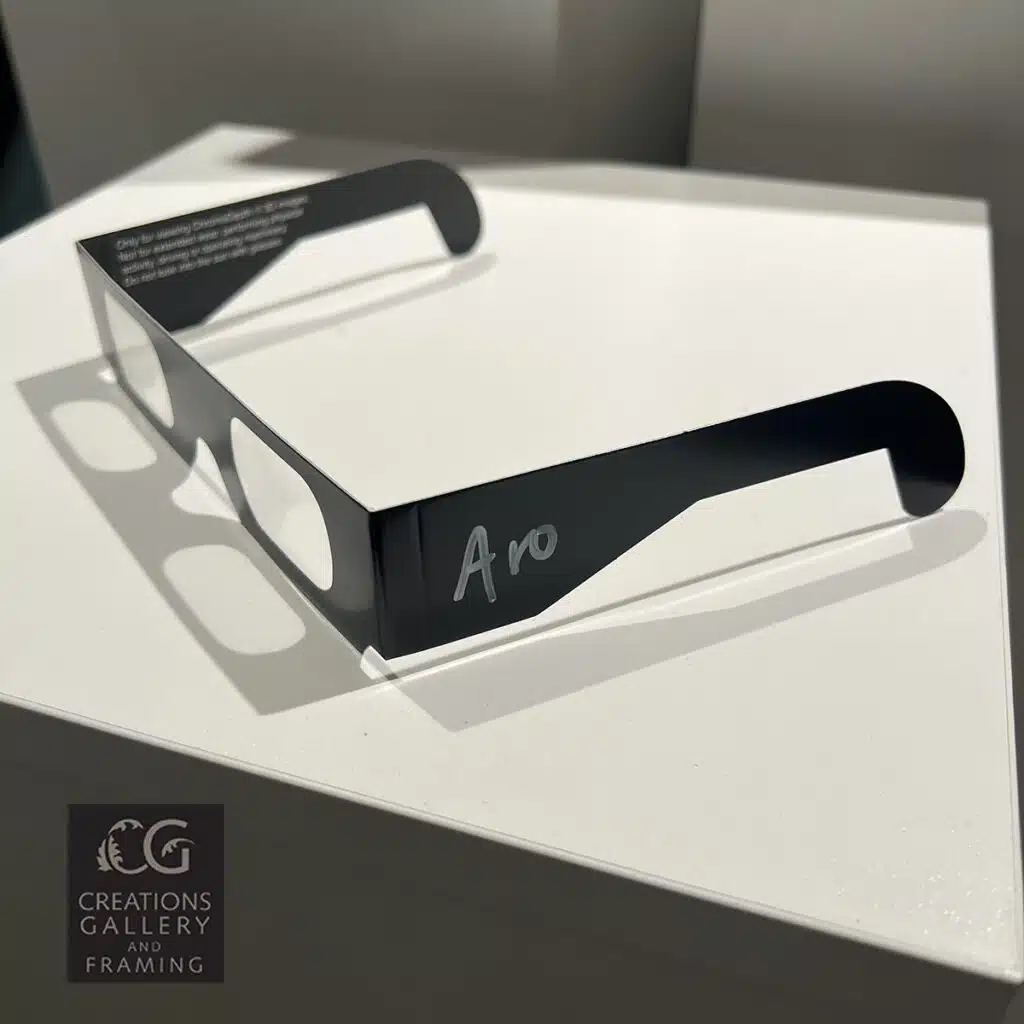 Pair of ARO branded ChromaDepth 3D glasses used for viewing 3D abstract impasto art