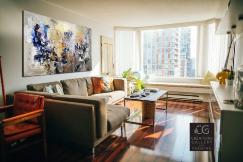Abstract Chromatic Currents – original acrylic on canvas by Maya Eventov, 48″ × 72″ — shown in a room setting