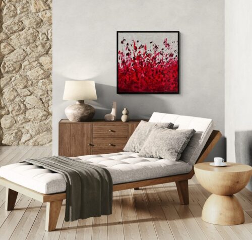 Aro Élan vital painting displayed on a grey wall above a linen daybed