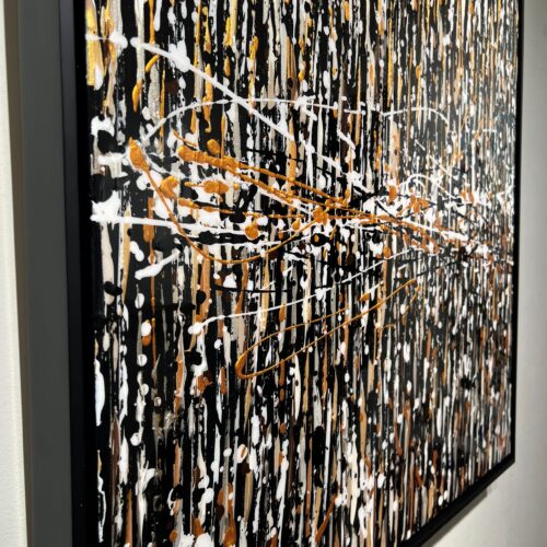 Close-up detail of Le grand frisson by Aro showing ivory and caramel touches over a near-black ground