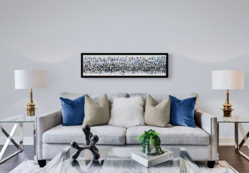 Aro Reflet du monde panoramic abstract painting displayed on a wall in a modern room setting