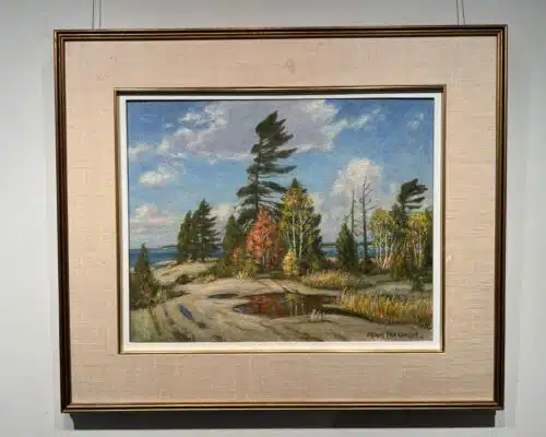 Georgian Bay by Frank Panabaker shown in a gold gallery frame with a wide linen mat