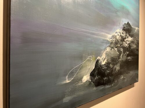 Detail of From Ancient Beginnings by Patricia Gagic - lavender-grey mist and looping white line work beside the dark rock mass