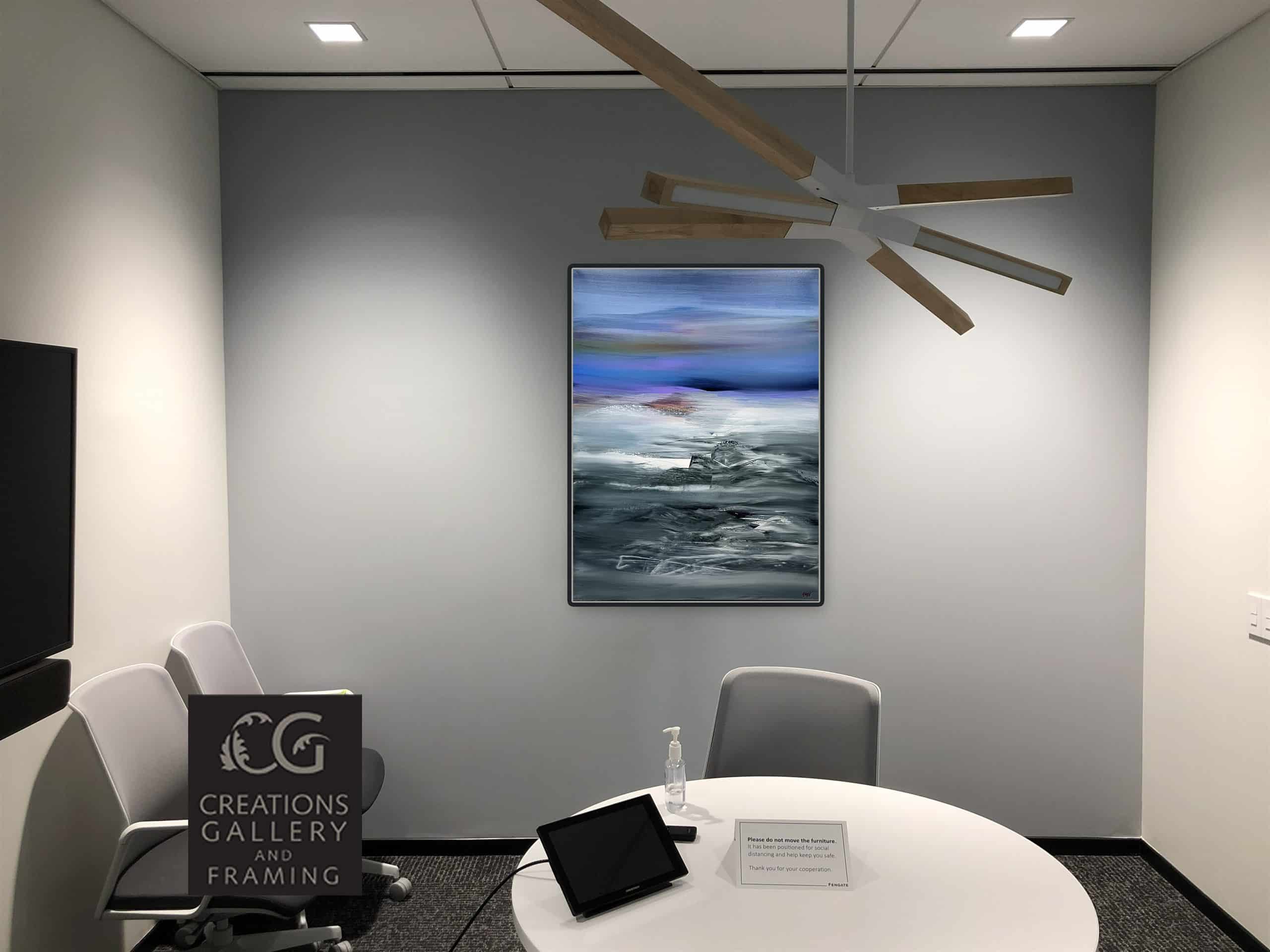 Phantom Realm by Patricia Gagic displayed on the wall of a modern office meeting room