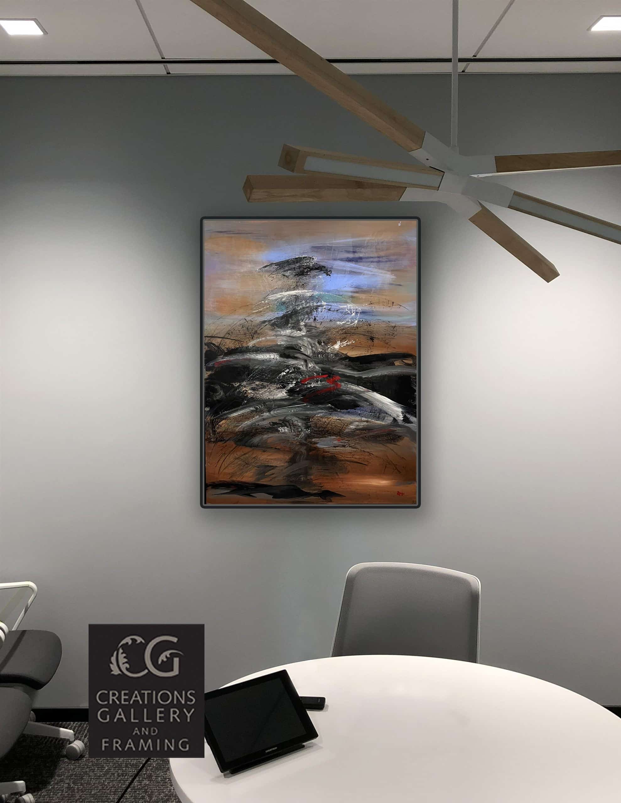 The Journey by Patricia Gagic displayed on the wall of a modern office meeting room