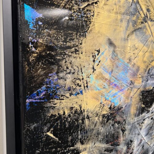 Detail of The Sphynx Revealed by Patricia Gagic - iridescent blue flash and champagne gold over pocked black texture